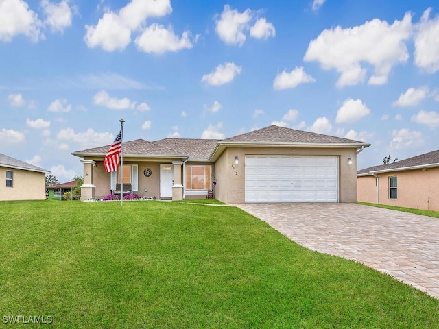 ranch-style house featuring a garage and a front yard