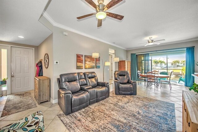 tiled living room featuring ornamental molding and ceiling fan