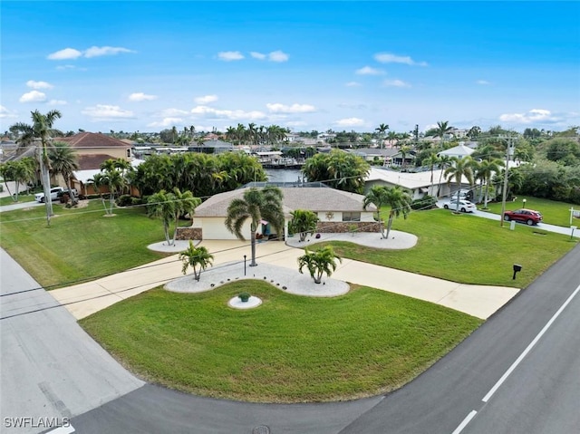 view of community with a yard