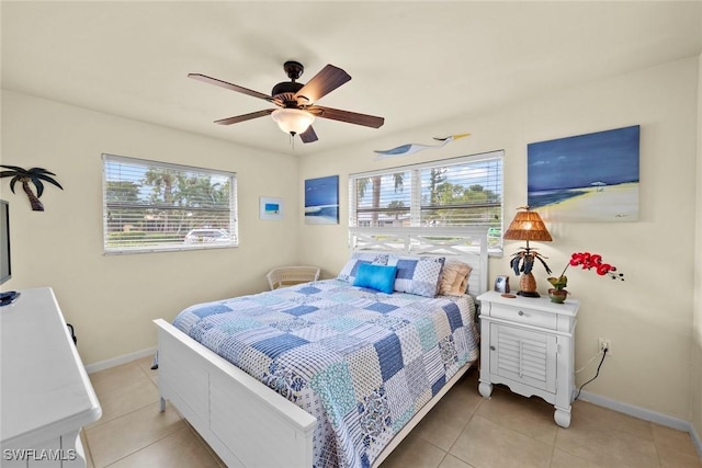 bedroom featuring ceiling fan and light tile patterned floors