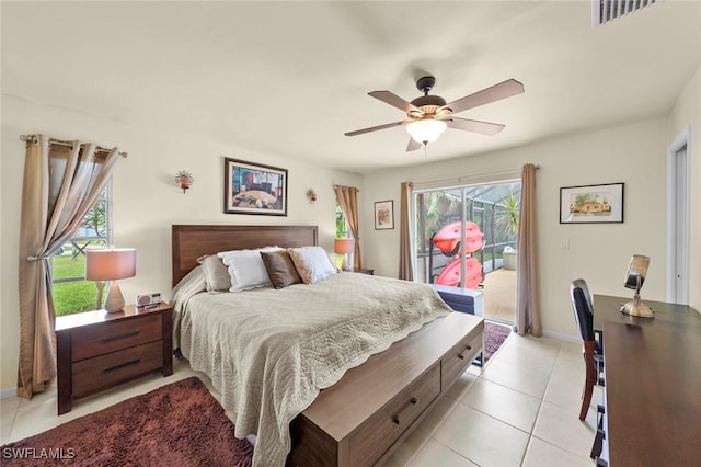 bedroom with light tile patterned flooring, ceiling fan, and access to exterior