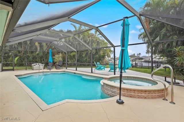 view of pool with an in ground hot tub, a lanai, a water view, and a patio area