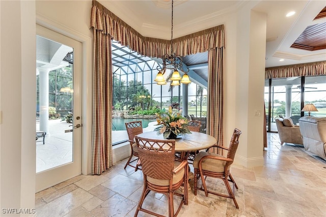 dining space featuring an inviting chandelier and crown molding