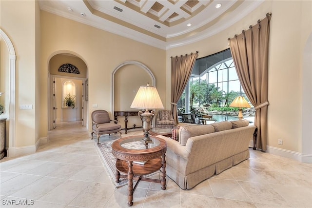 interior space featuring a towering ceiling, ornamental molding, light tile patterned flooring, beam ceiling, and coffered ceiling