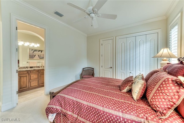 carpeted bedroom featuring ceiling fan, connected bathroom, and crown molding