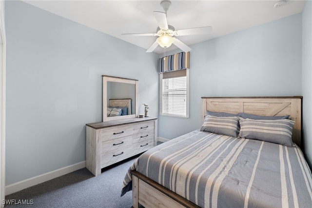 carpeted bedroom featuring ceiling fan and baseboards