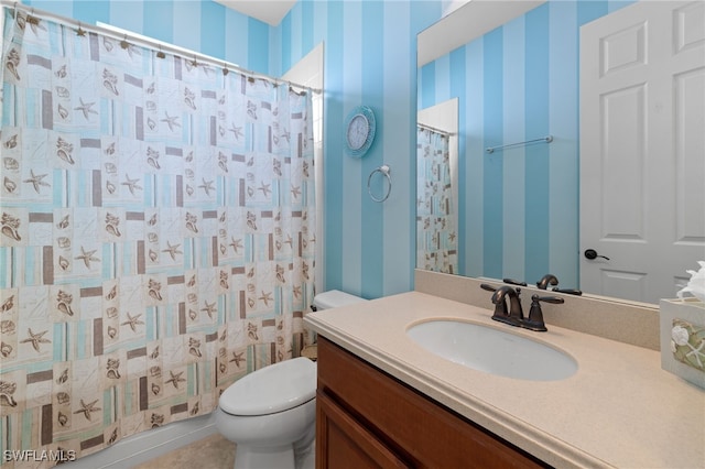 bathroom featuring toilet, wallpapered walls, a shower with curtain, and vanity