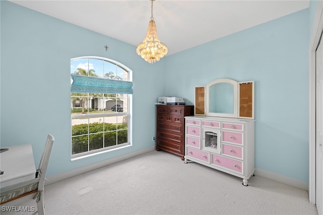 bedroom with multiple windows, light carpet, and a chandelier