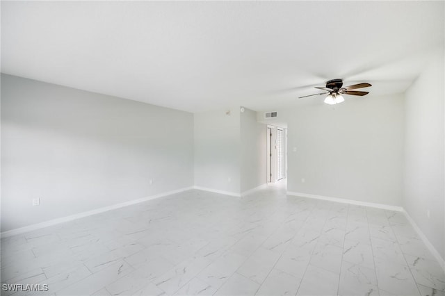 spare room featuring ceiling fan