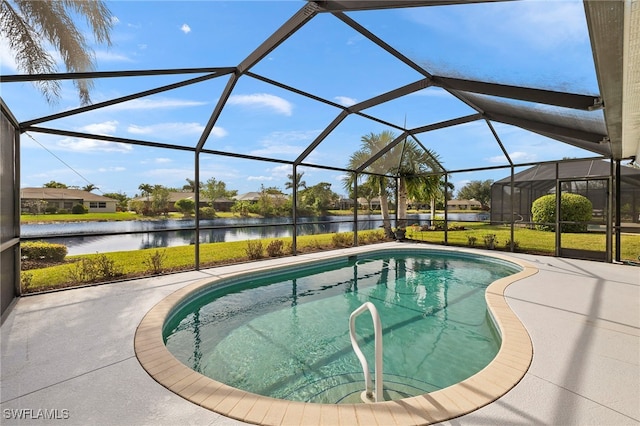 view of swimming pool with a lanai, a patio area, and a water view