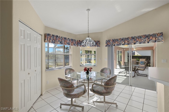 dining room with ceiling fan and light tile patterned floors