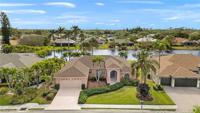 drone / aerial view featuring a water view