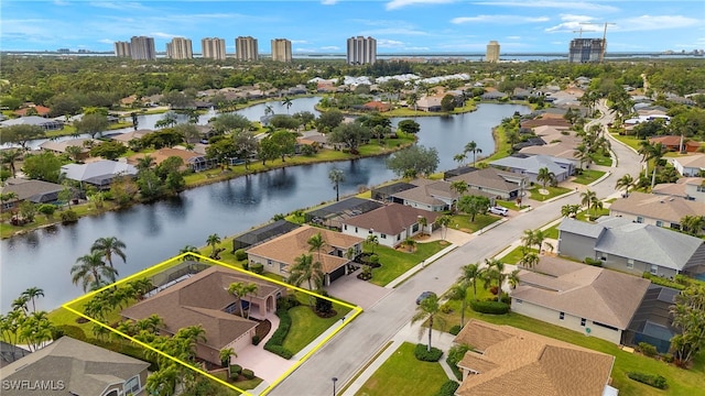 drone / aerial view featuring a water view