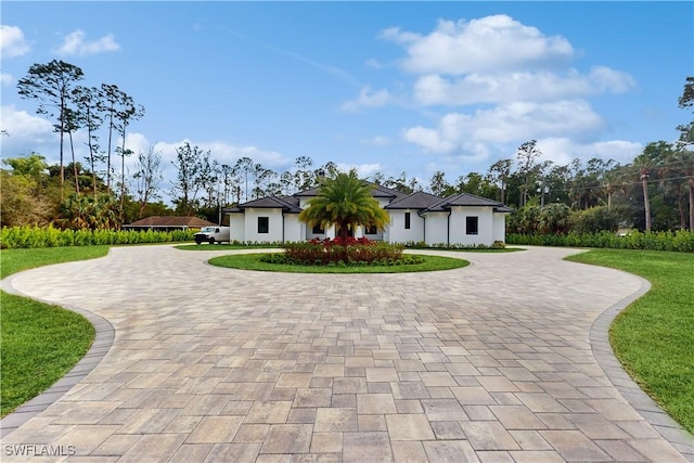 view of front of property with a front lawn