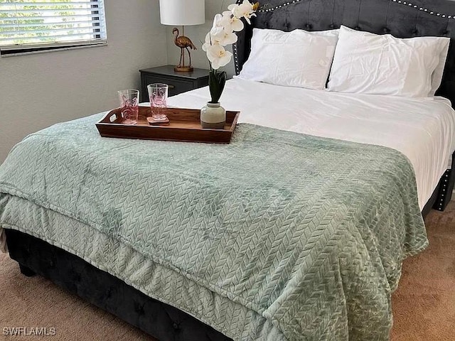 bedroom featuring carpet floors