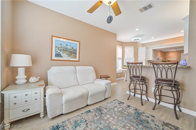 living room with ceiling fan