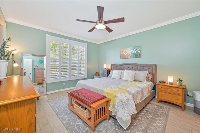 bedroom featuring ornamental molding, light wood-type flooring, and ceiling fan