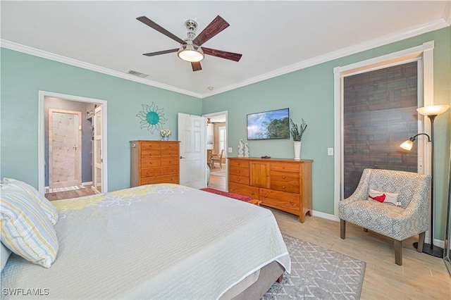 bedroom with ensuite bath, ceiling fan, hardwood / wood-style flooring, and ornamental molding