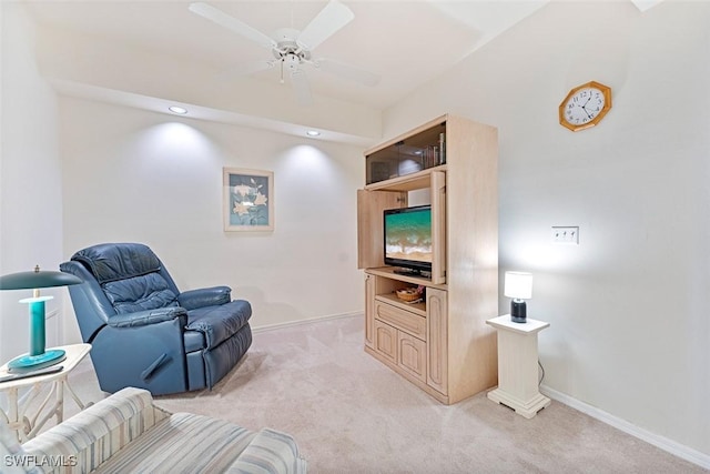 living room with ceiling fan and light carpet