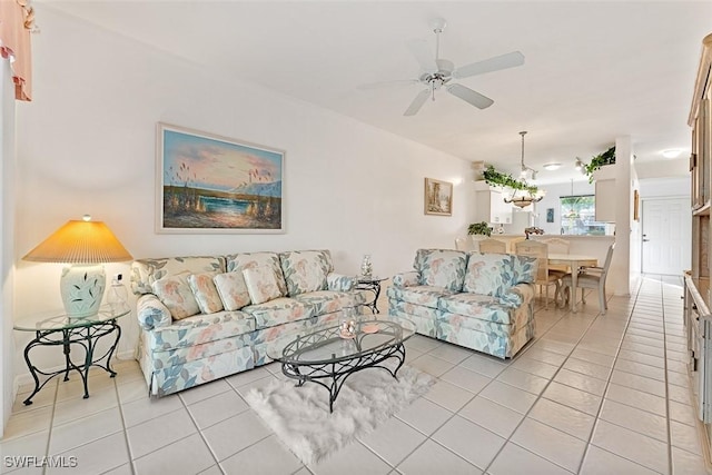 tiled living room featuring ceiling fan