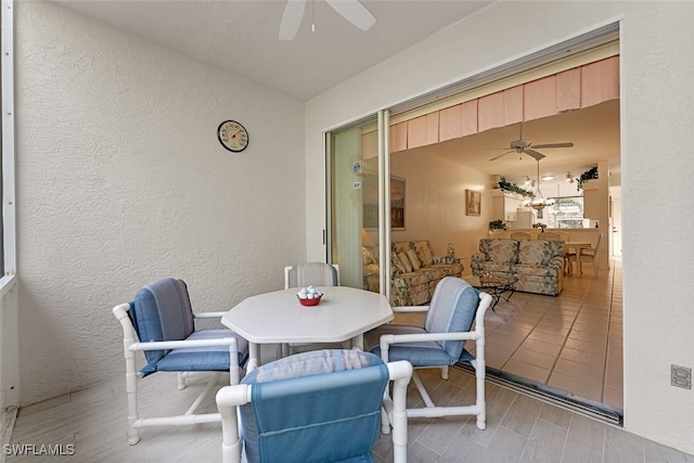 view of patio / terrace featuring ceiling fan