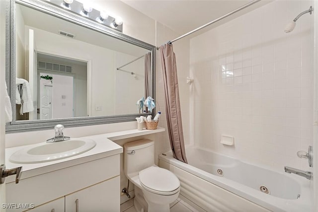 full bathroom with toilet, vanity, and shower / bath combination with curtain