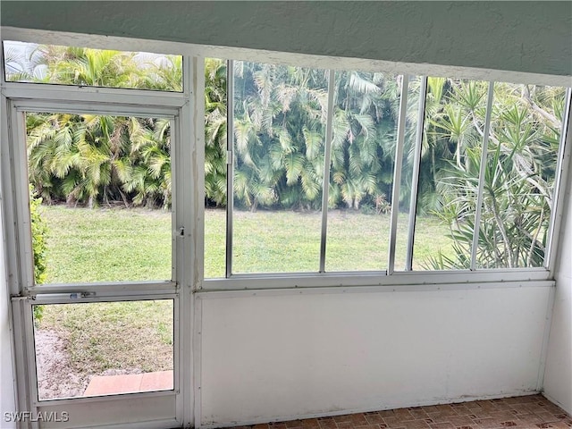 doorway to outside featuring plenty of natural light