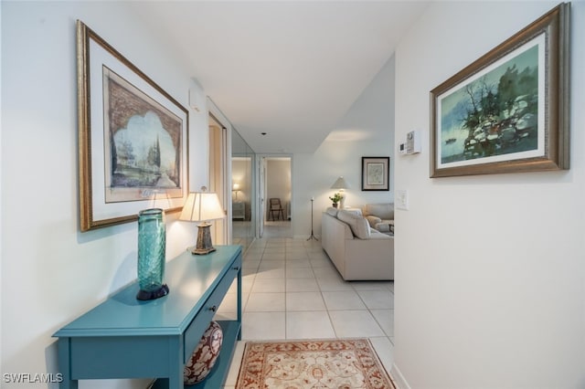 hall with light tile patterned flooring