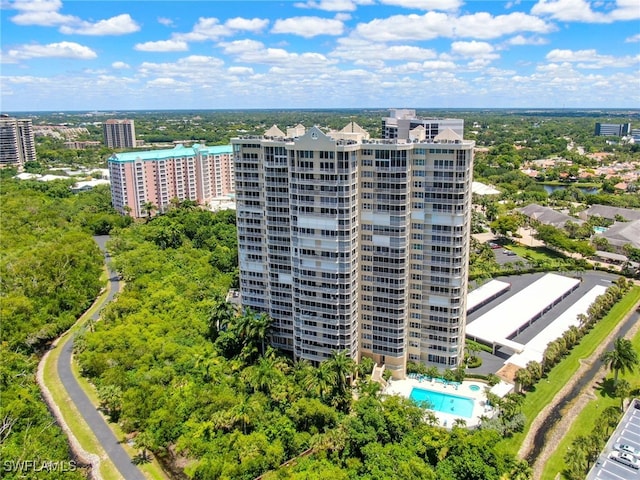 birds eye view of property with a city view