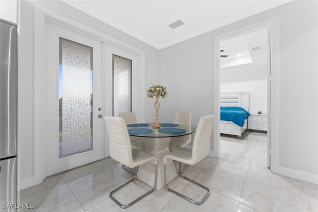 dining area featuring french doors