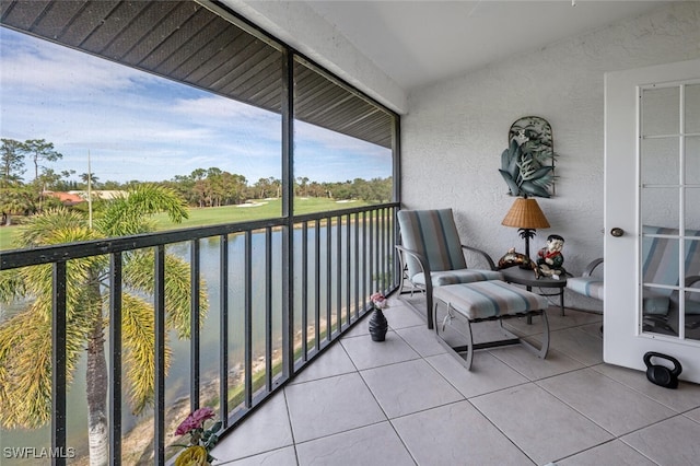 balcony featuring a water view