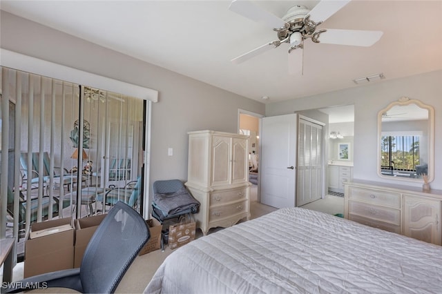 bedroom featuring connected bathroom and ceiling fan