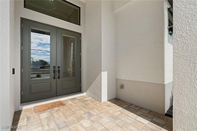 doorway to property featuring french doors