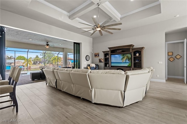 living room with ceiling fan, ornamental molding, beamed ceiling, and coffered ceiling