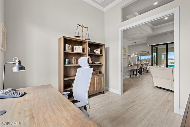 office featuring crown molding and light wood-type flooring