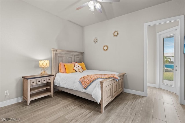 bedroom featuring ceiling fan and light hardwood / wood-style floors