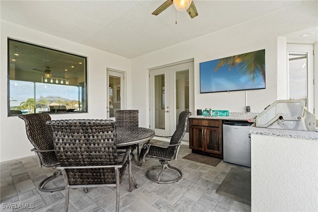 view of patio featuring ceiling fan