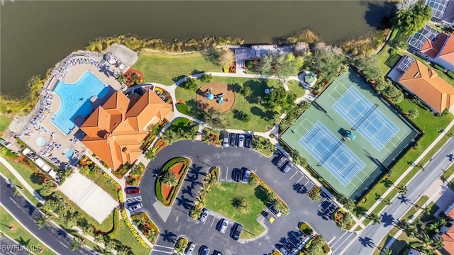 bird's eye view with a water view