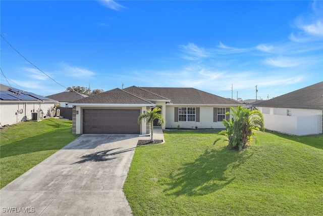 single story home with central AC, a front lawn, and a garage