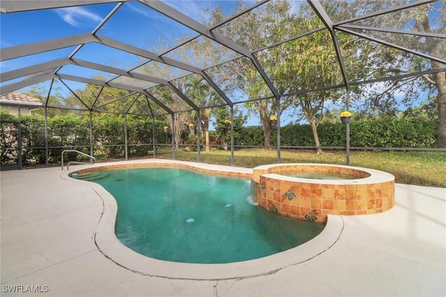 view of pool with a patio area, a lanai, and an in ground hot tub