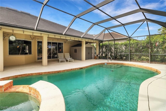 view of swimming pool featuring a lanai and a patio