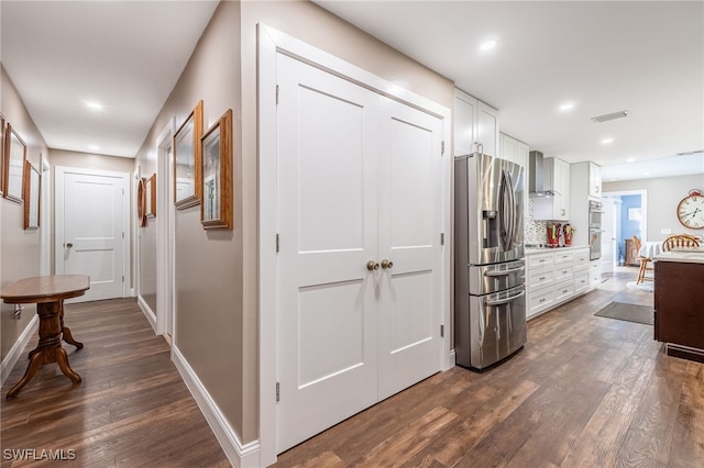 corridor featuring dark wood-type flooring