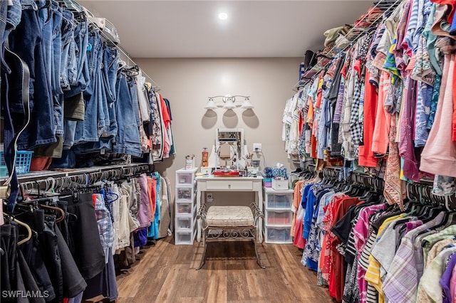 spacious closet featuring hardwood / wood-style floors