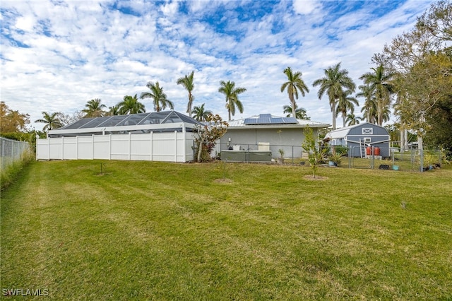 view of yard featuring glass enclosure