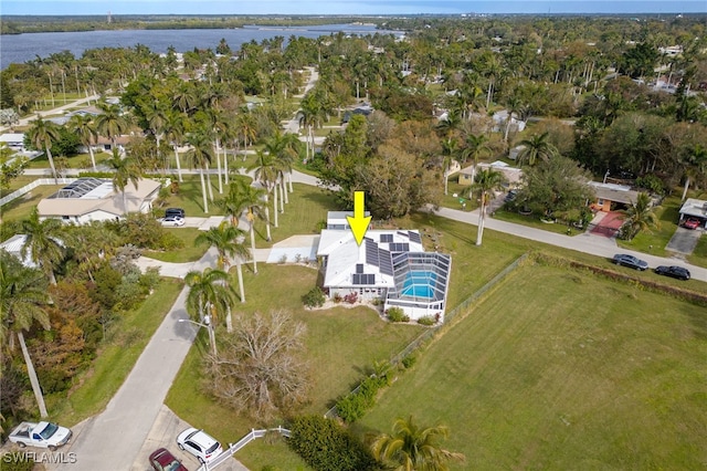 birds eye view of property featuring a water view