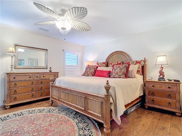 bedroom featuring hardwood / wood-style flooring and ceiling fan