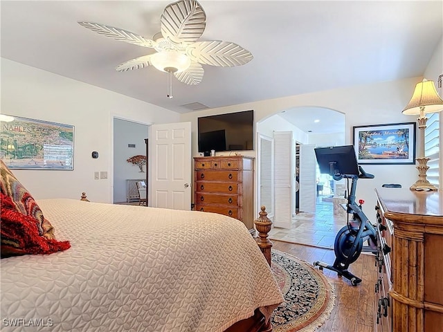 bedroom featuring hardwood / wood-style flooring and ceiling fan