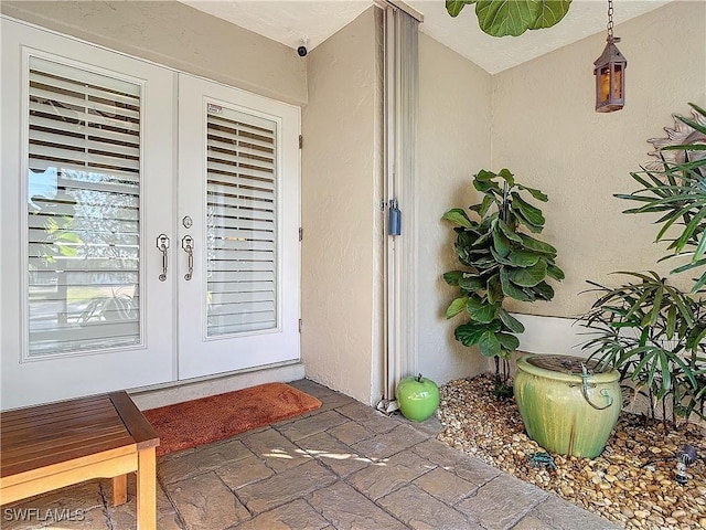 doorway to property with french doors