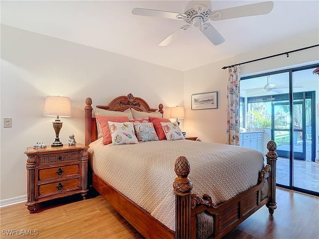 bedroom with ceiling fan, wood-type flooring, and access to exterior