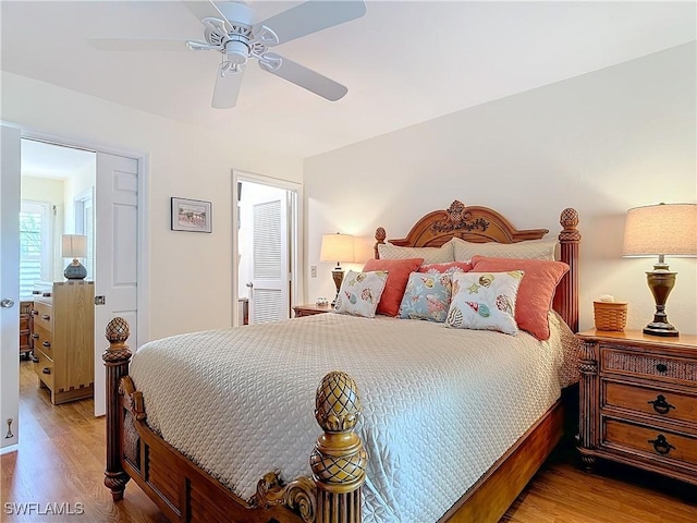 bedroom featuring light wood-type flooring and ceiling fan